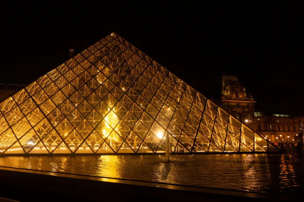 Louvre pyramid by night
